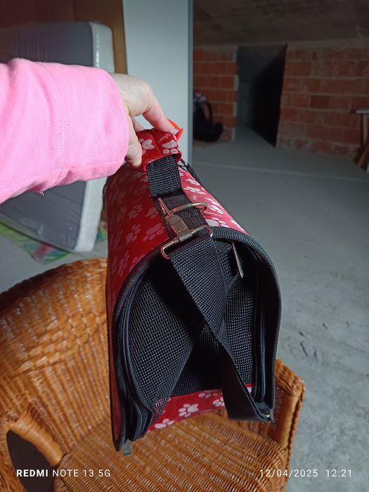 Transportadora em tecido.