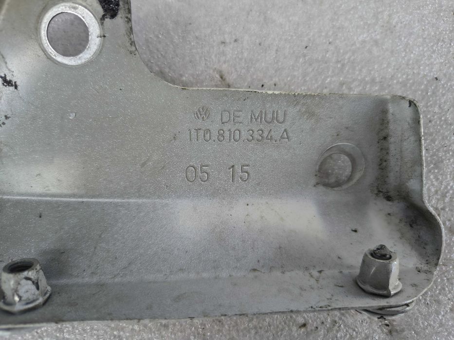 Wspornik mocowanie błotnika lewe przód VW Touran II 1T3 1T0821135C