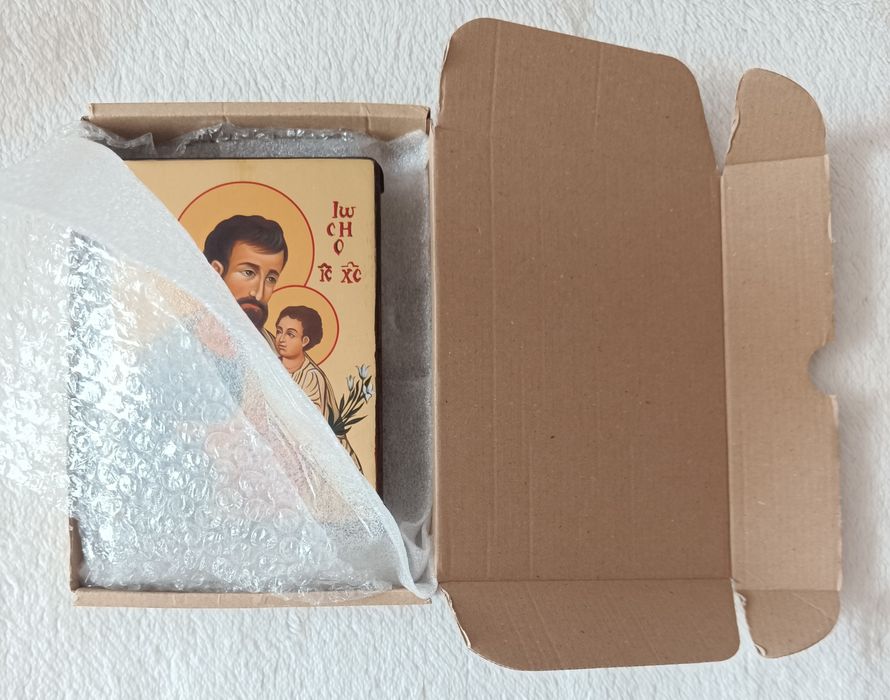 Ikona św. Józefa na desce z certyfikatem.