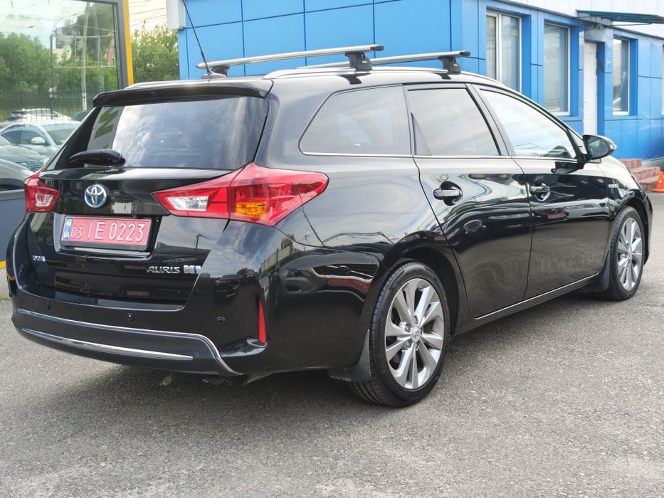 TOYOTA AURIS HYBRID 1,8 бенз+електро  2014 ІДЕАЛ ВІДЕО