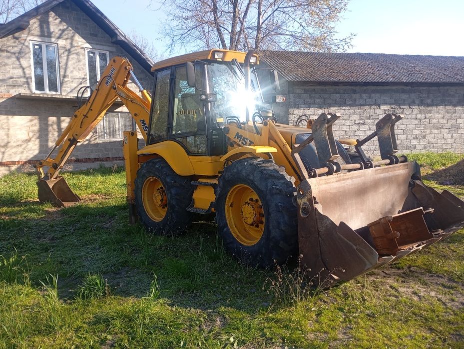 koparko-ładowarkę JCB   SANKO MST M544