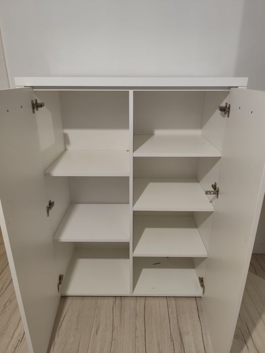 Zestaw białych mebli komoda szafka tv