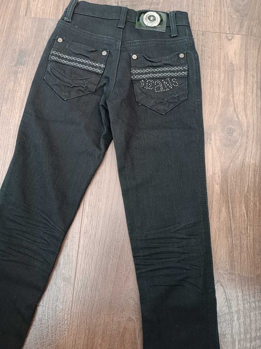 Spodnie jeansowe dla dziewczynki w rozmiarze 140 (22)