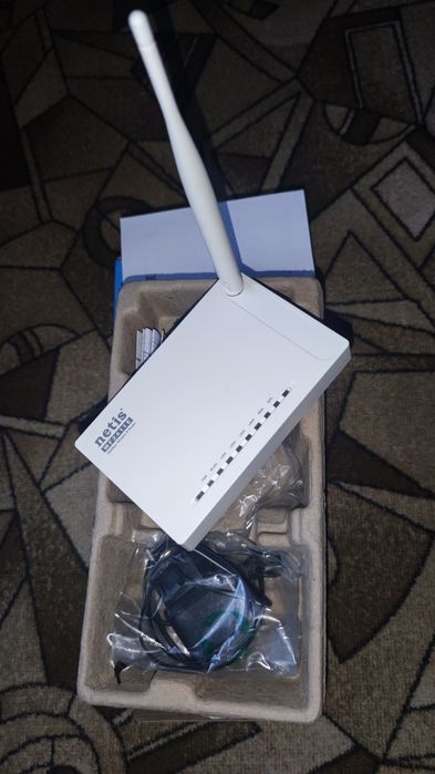 Маршрутизатор  *netis*.