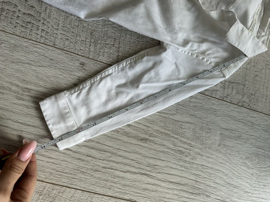 Біла сорочка next