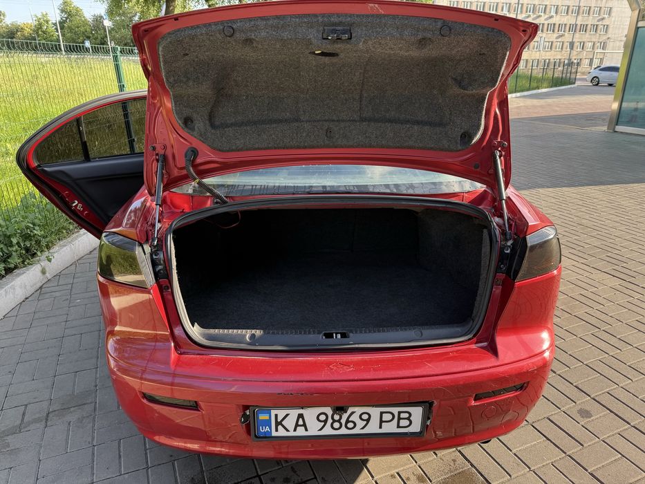 Lancer 10 2011 2.0 автомат / газ