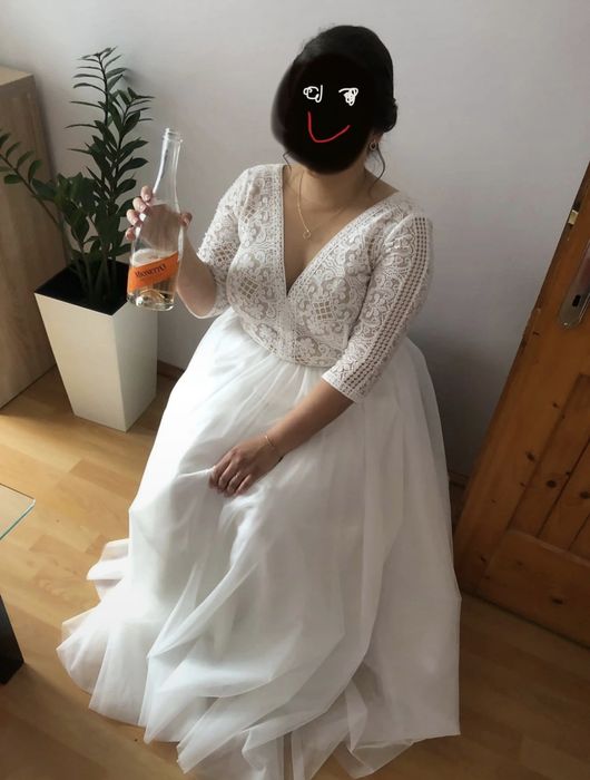 Suknia ślubna z rękawkiem