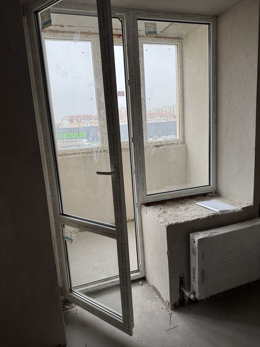 Нове вікно с дверами