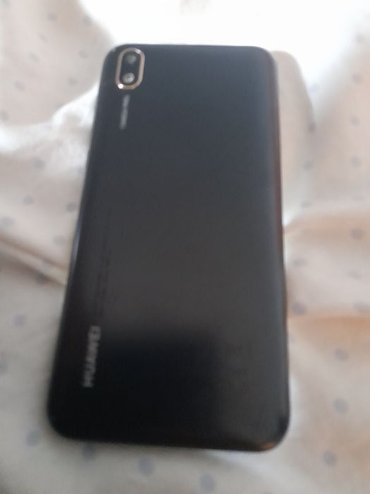 Telefone huawei tem que trocar a capa de traz