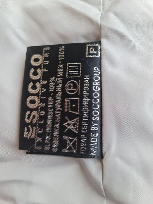 Женский пуховик с мехом