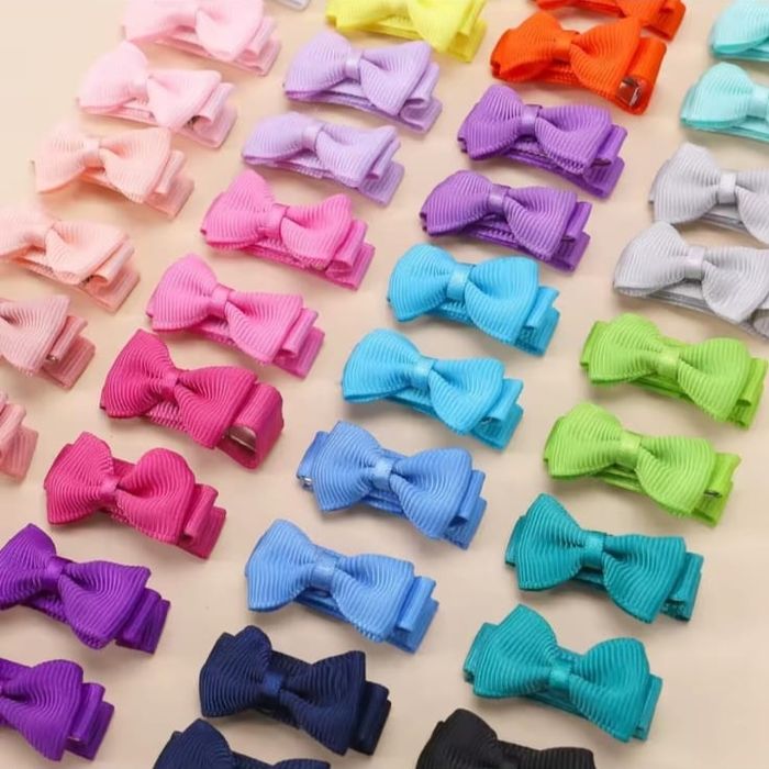 Заколка  бантик 118 шт .