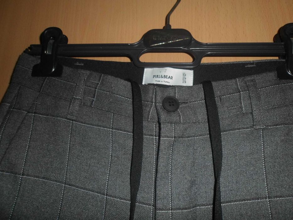 calças para homem da marca PULL&BEAR como novas