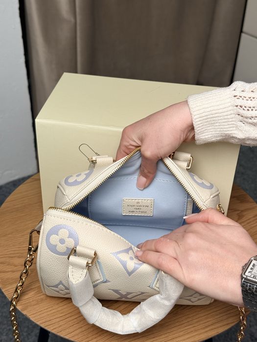 Сумка Louis Vuitton Speedy Bandouliere 20 Ivory / Light Purple Monogram