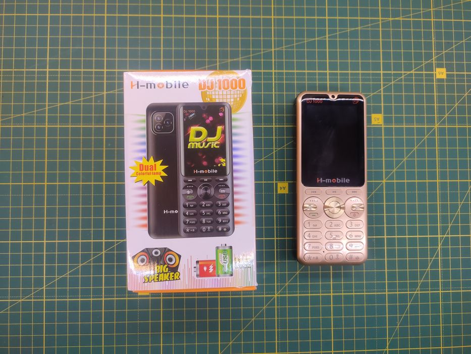 Телефон 4 sim карты H-mobile DJ1000