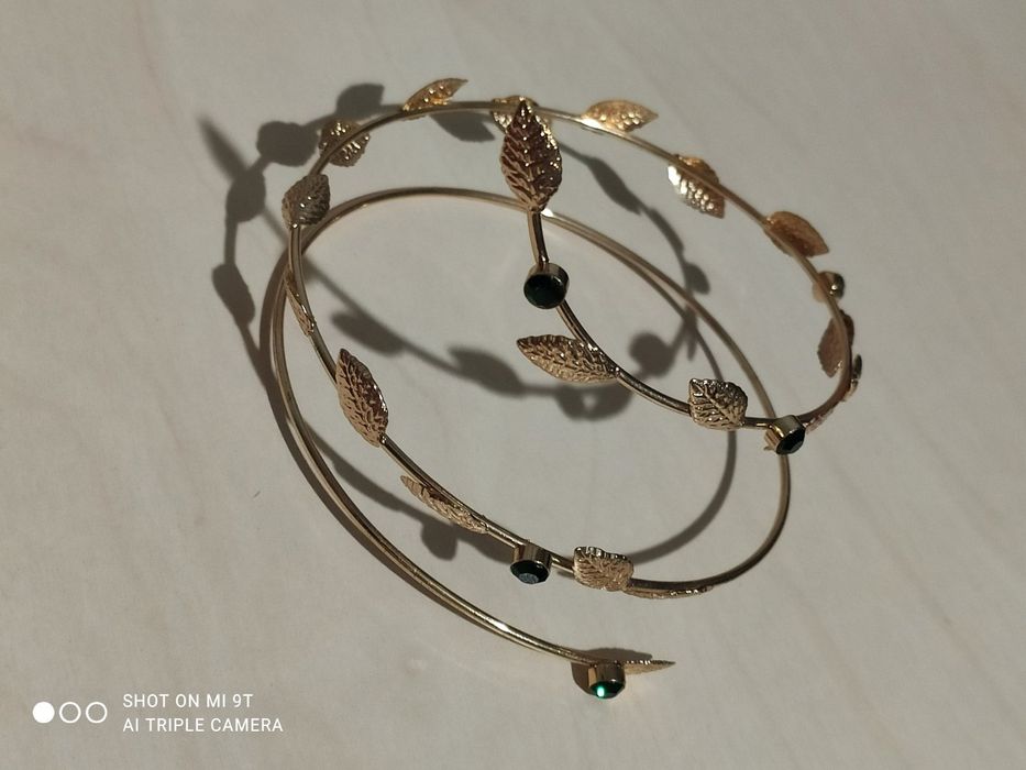 Спіральний браслет на плече (arm cuff).