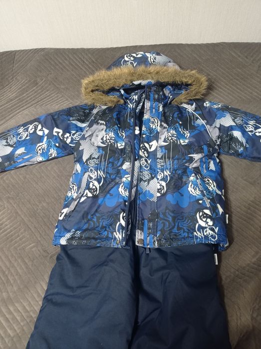 Продам зимний комбинезон Huppa