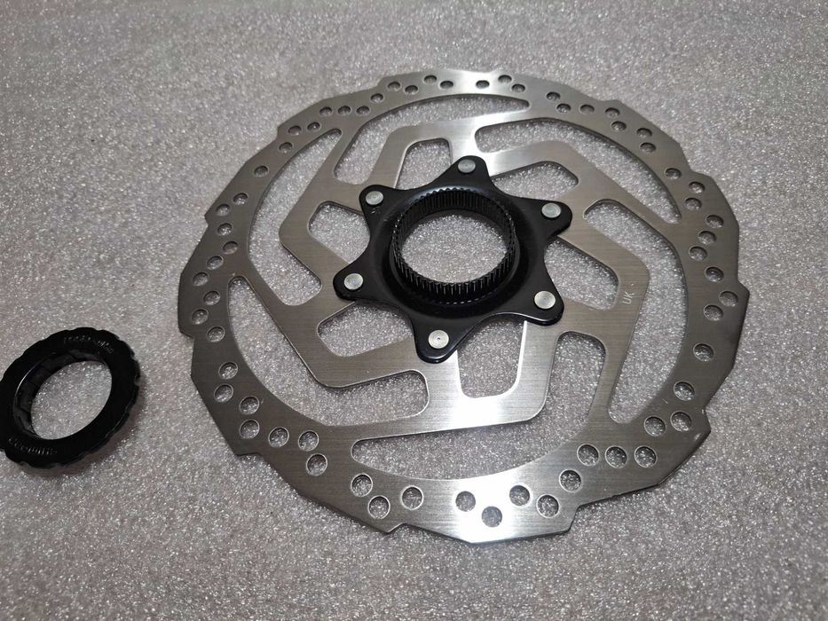 Tarcza Hamulca Rowerowego Shimano SM-RT10 180 Nowa Centerlock Nakrętka