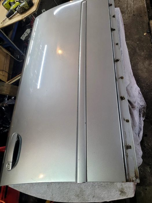 Drzwi prawe przód przednie Audi A4 B6 00- kod lakieru LY7Q