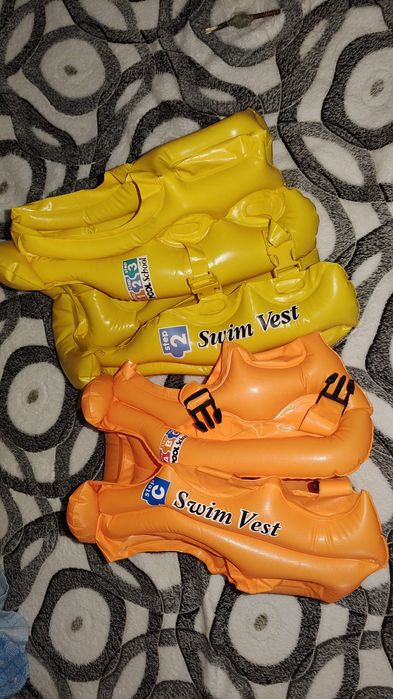 Жилети для купання дитячі
