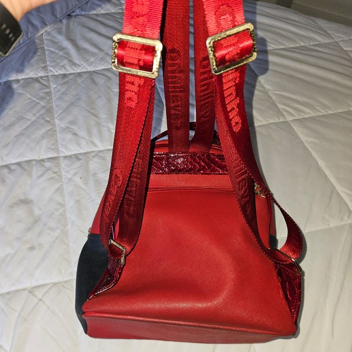 Vendo mochila + porta moedas cavalinho