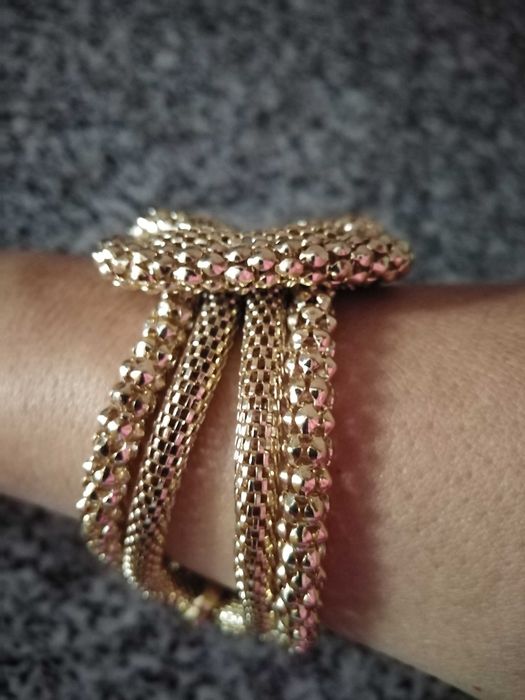 Bijuteria Pulseiras dourada entrelaçada e prateada