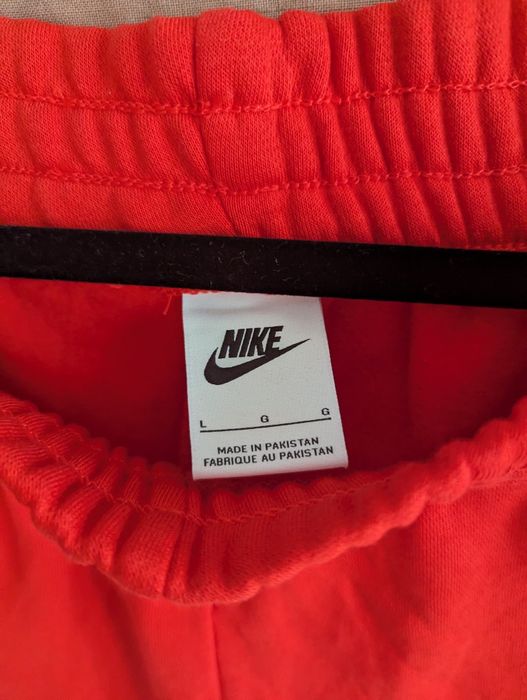 Спортивні штани Nike колір червоний лосось