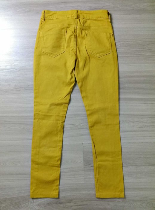 Damskie spodnie jeansy żółte musztardowe rozciągliwe Asos 36