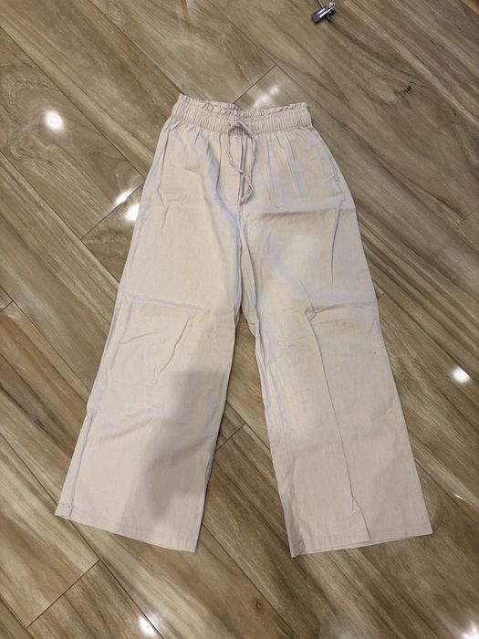 Легкі рожеві штани