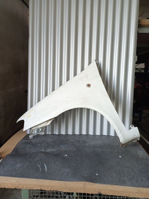 Guarda Lamas Fiat Punto II ESQUERDO  Branco