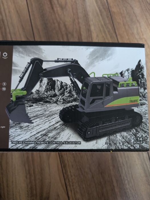 Koparka na gąsienicach zdalnie sterowana muzyka,swiatla, 2 akumulatory