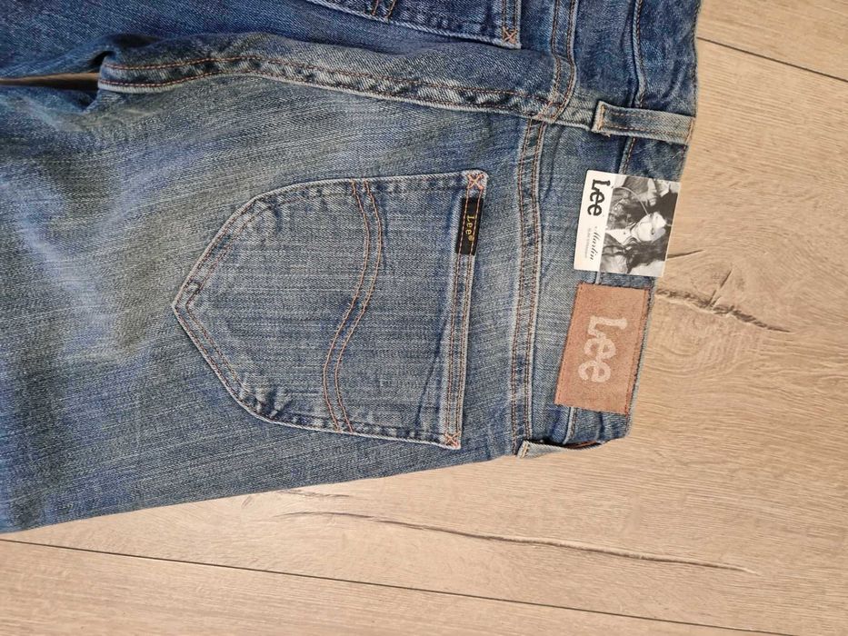 Nowe damskie spodnie jeansowe LEE rozmiar W26 L31