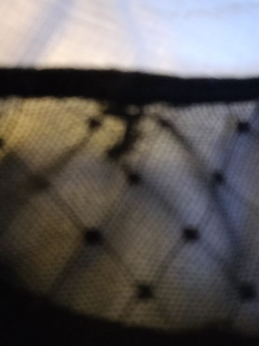 Piękny pas do pończoch.