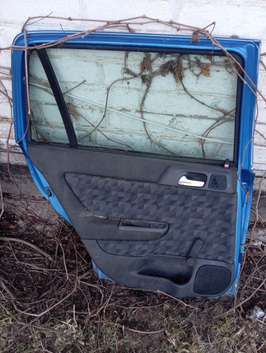 Продам двері Опель Астра G