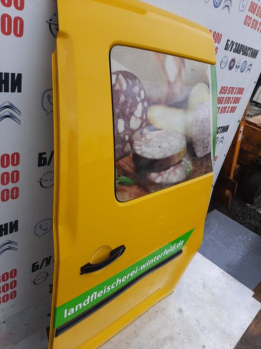 Дверка бокова ліва WV Caddy зі склом