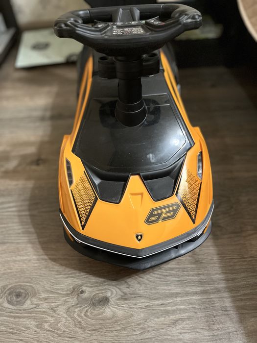 Толокар машина Lamborgini, з батьківською ручкою