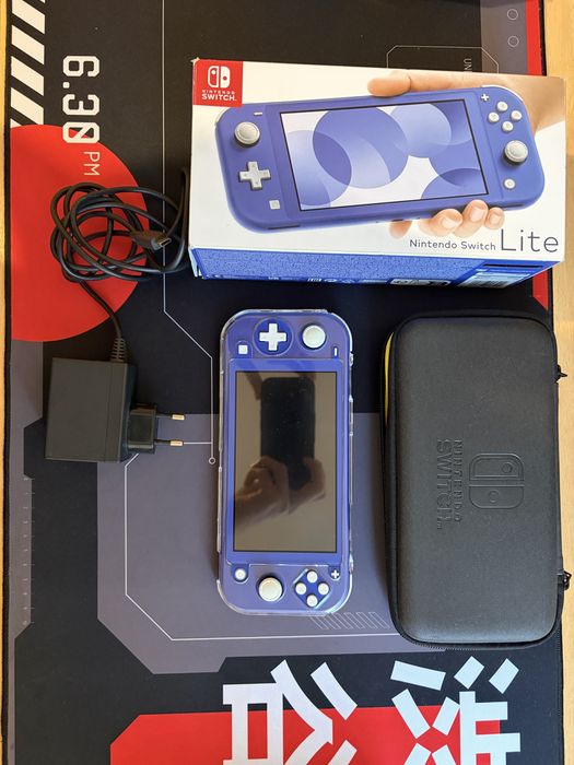 Nintendo Switch Lite + sd karta 128GB + pokrowiec / etui