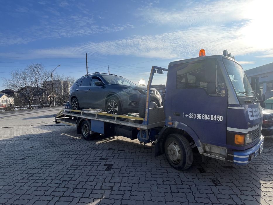 Евакуатор цілодобово перевезення сільхозтехніки