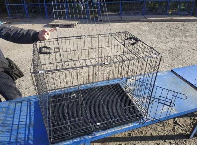 Клітка транспортер для перевезення собак