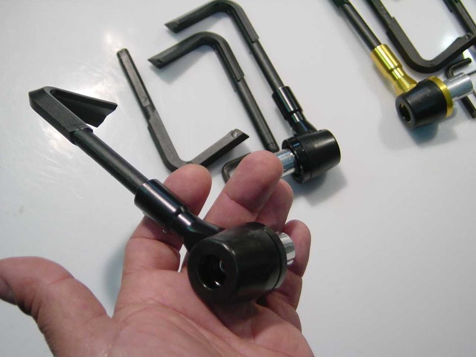 Topos protetores de manetes para guiador ou avanços