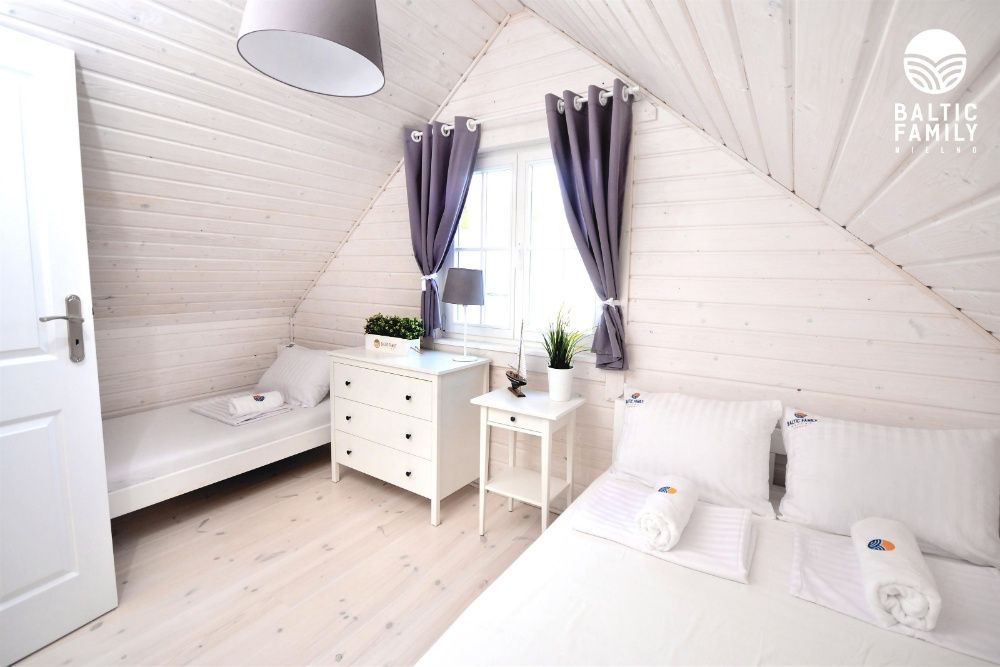 Domki nad Morzem z Basenem Wielkanoc Wakacje Wczasy Noclegi Mielno Bon