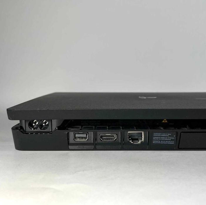 PS4 Slim 1TB Desbloqueada + GTA 5 + FC26 + RD2 + 1 Comando Novo + Cabo