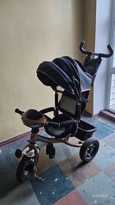 Триколісний велосипед з батьківською ручкою