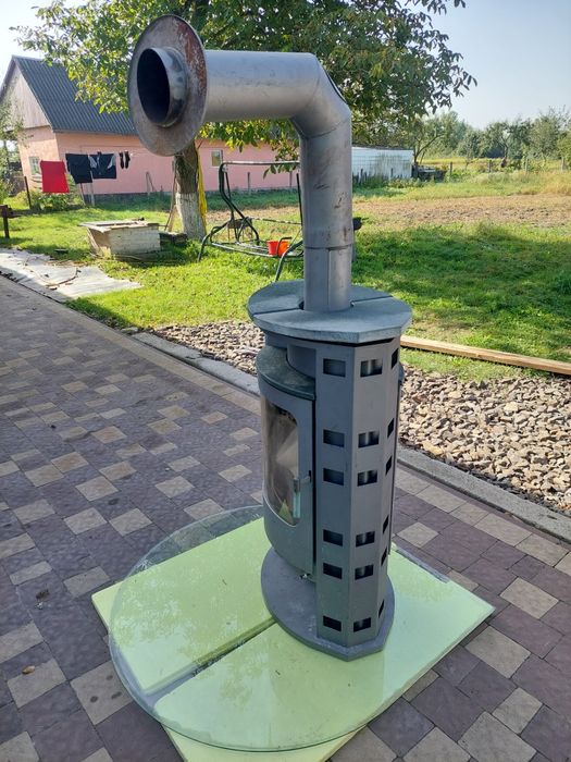 Камін з кам'яною обліцовкою