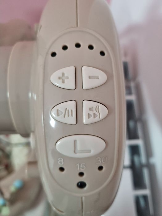 Крісло качалка, заколисуючий центр Carello