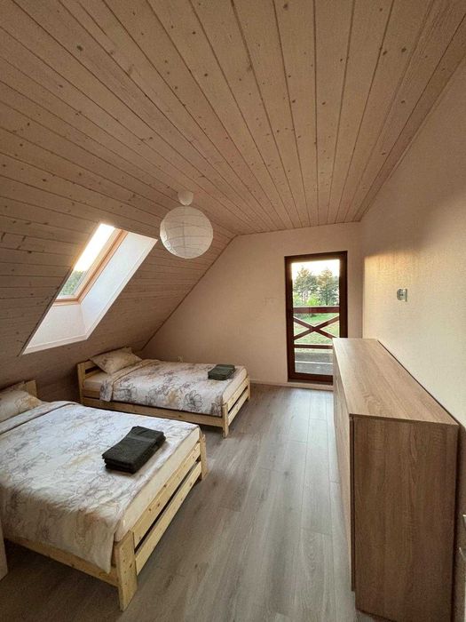 Całoroczny domek nad jeziorem z prywatną plażą – dla 4-10 osób