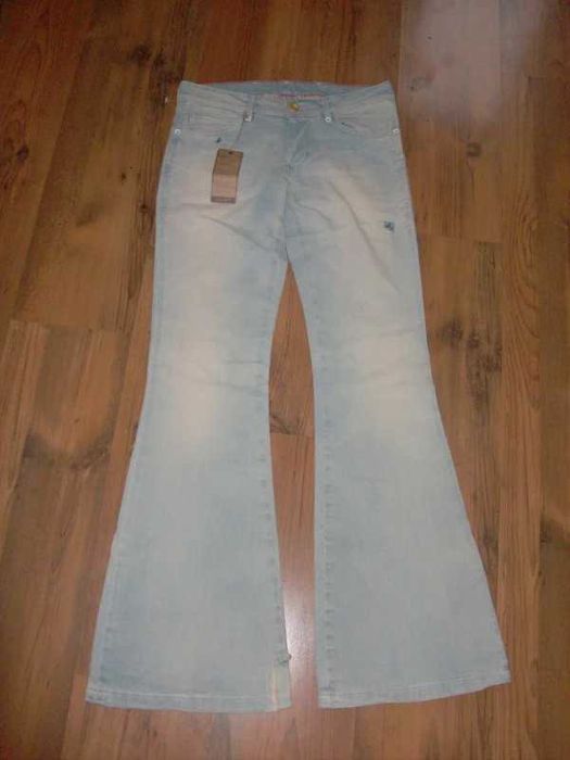 Spodnie jeansy Wrangler nowe "połatane" R.36
