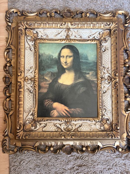Mona Lisa w spektakularnej,złoconej ramie!