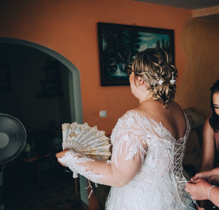 Suknia ślubna długi rękaw piórka