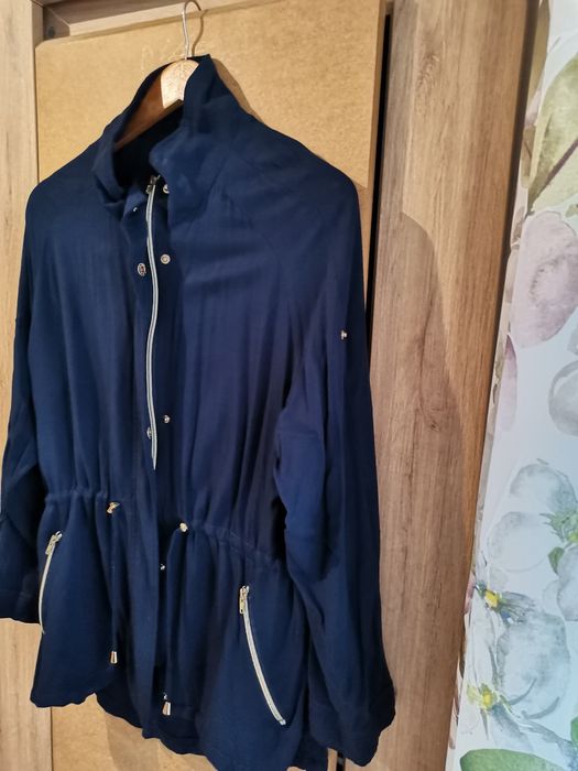 Śliczna pomaranczowa parka 42