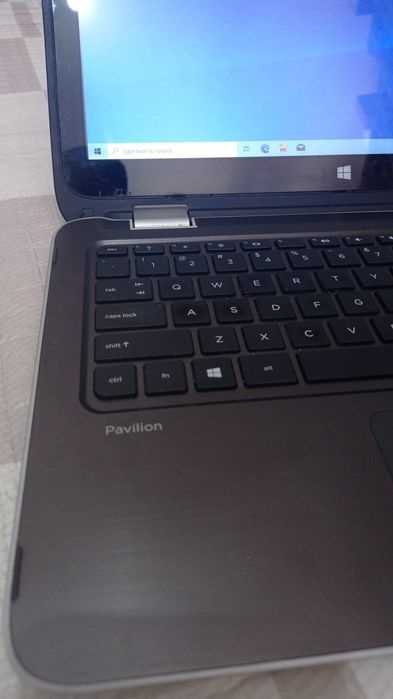 Hp i3-4030U laptop with charger,4 GB ram/128 GB SSD windows 10.